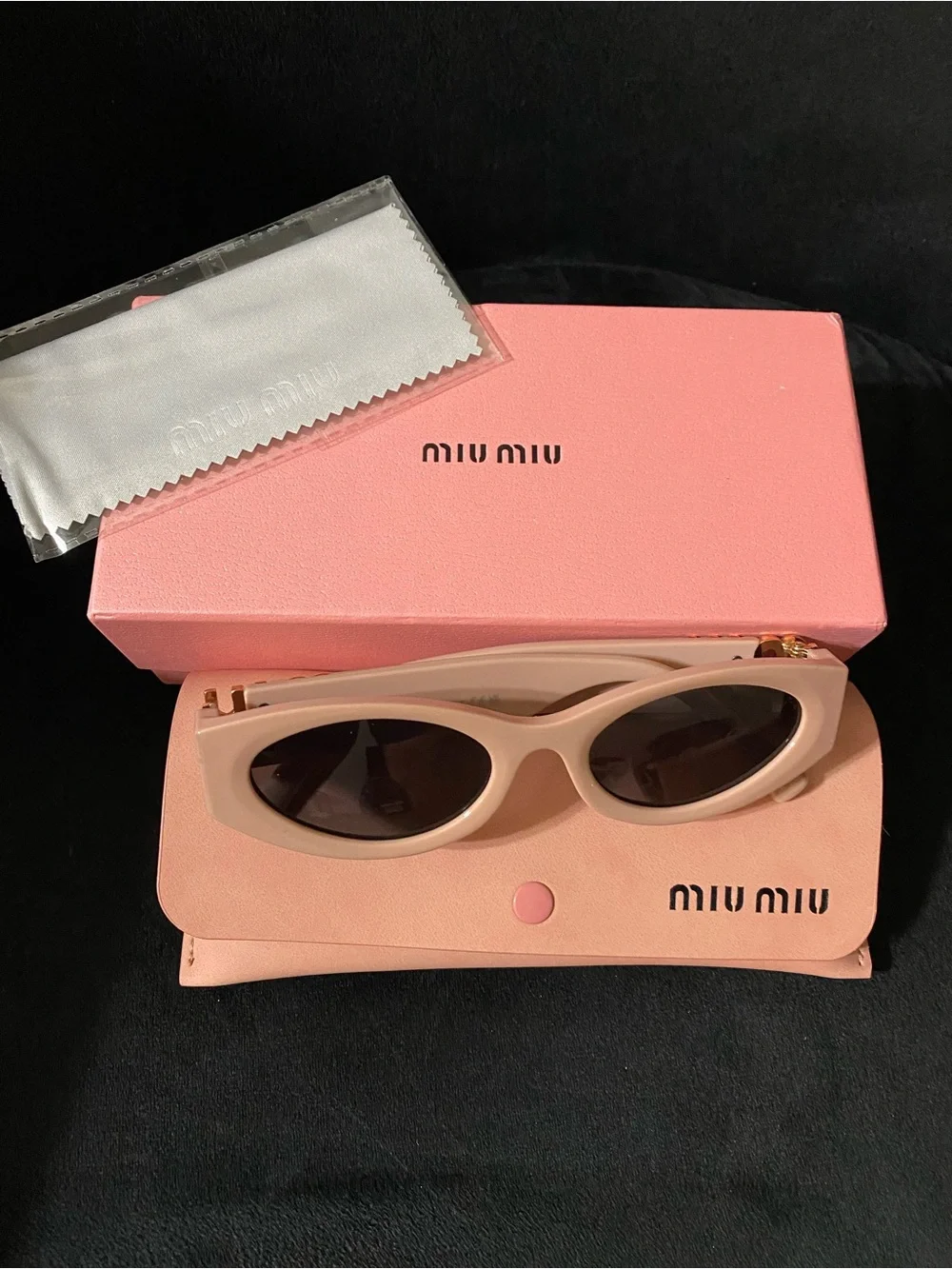 Miu Miu Blush Pink Blush Oval Sunglasses